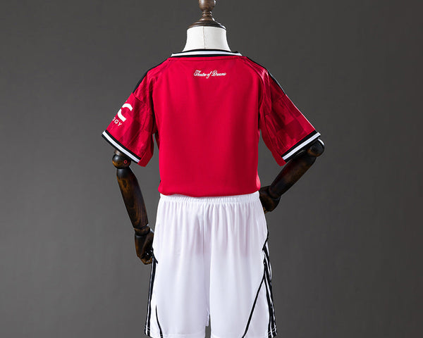 KIT ENFANT 25/26 MANCHESTER UNITED DOMICILE